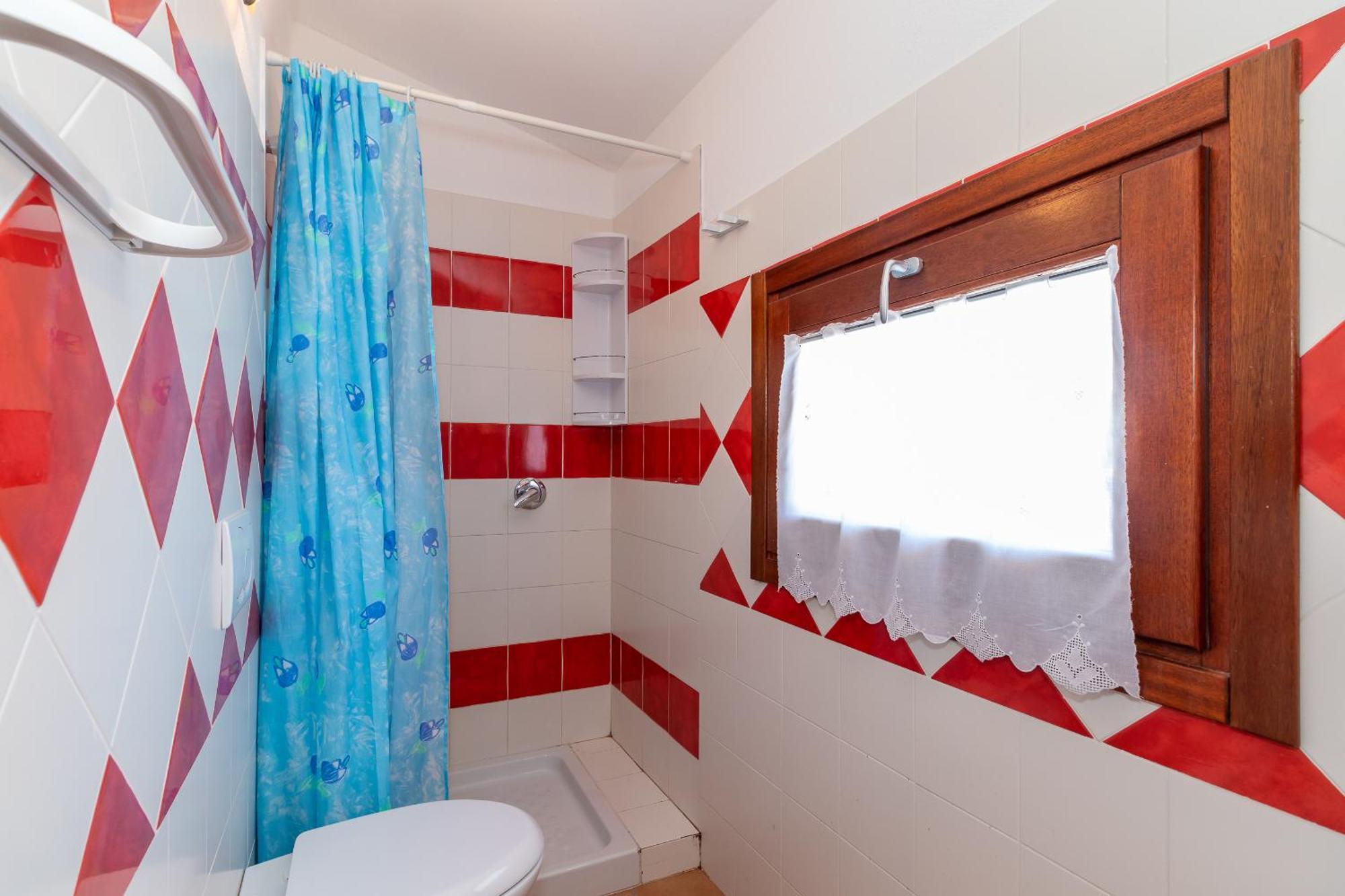 Casa Sulla Scogliera Isola Rossa Apartman Kültér fotó