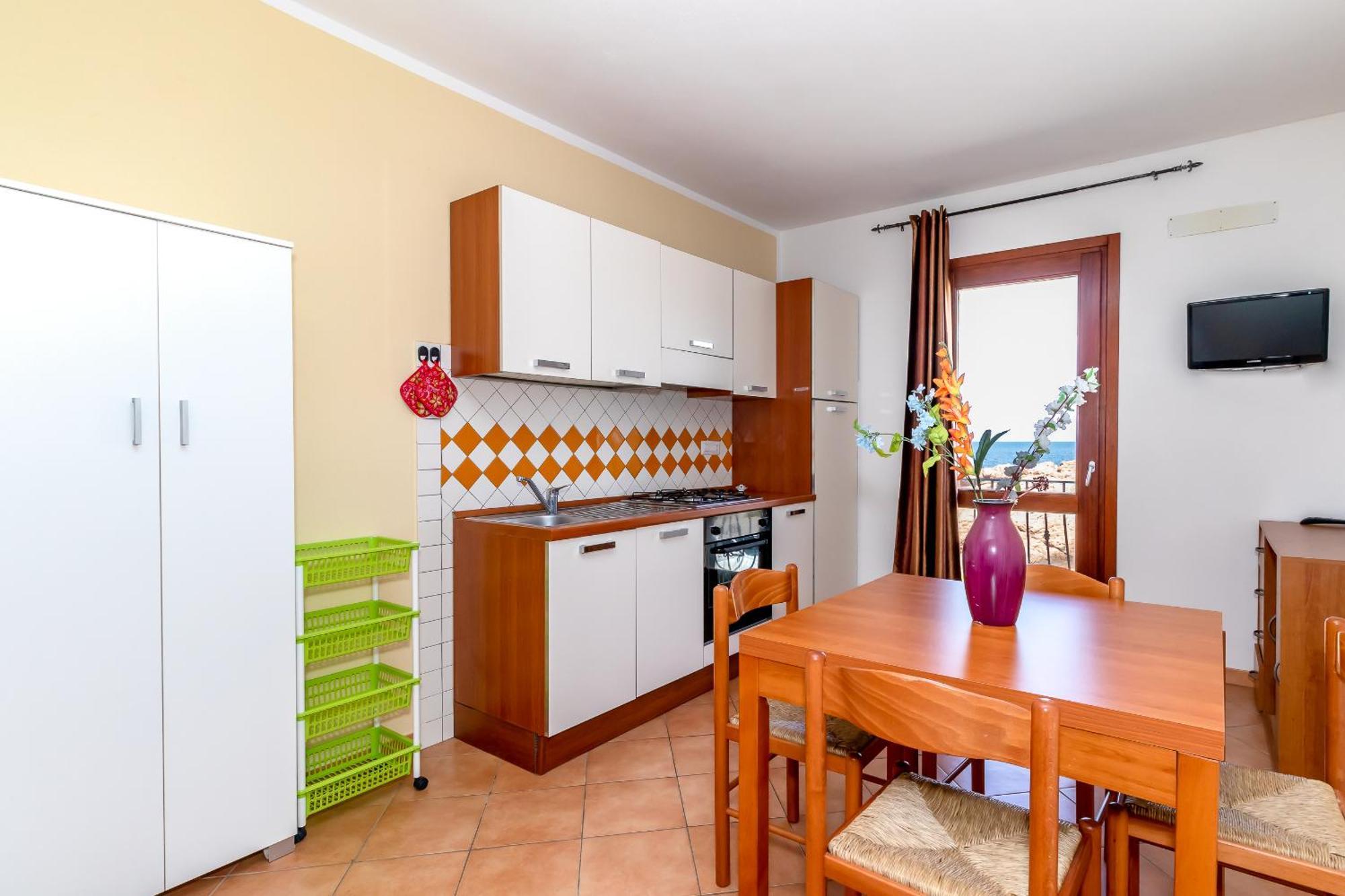 Casa Sulla Scogliera Isola Rossa Apartman Kültér fotó